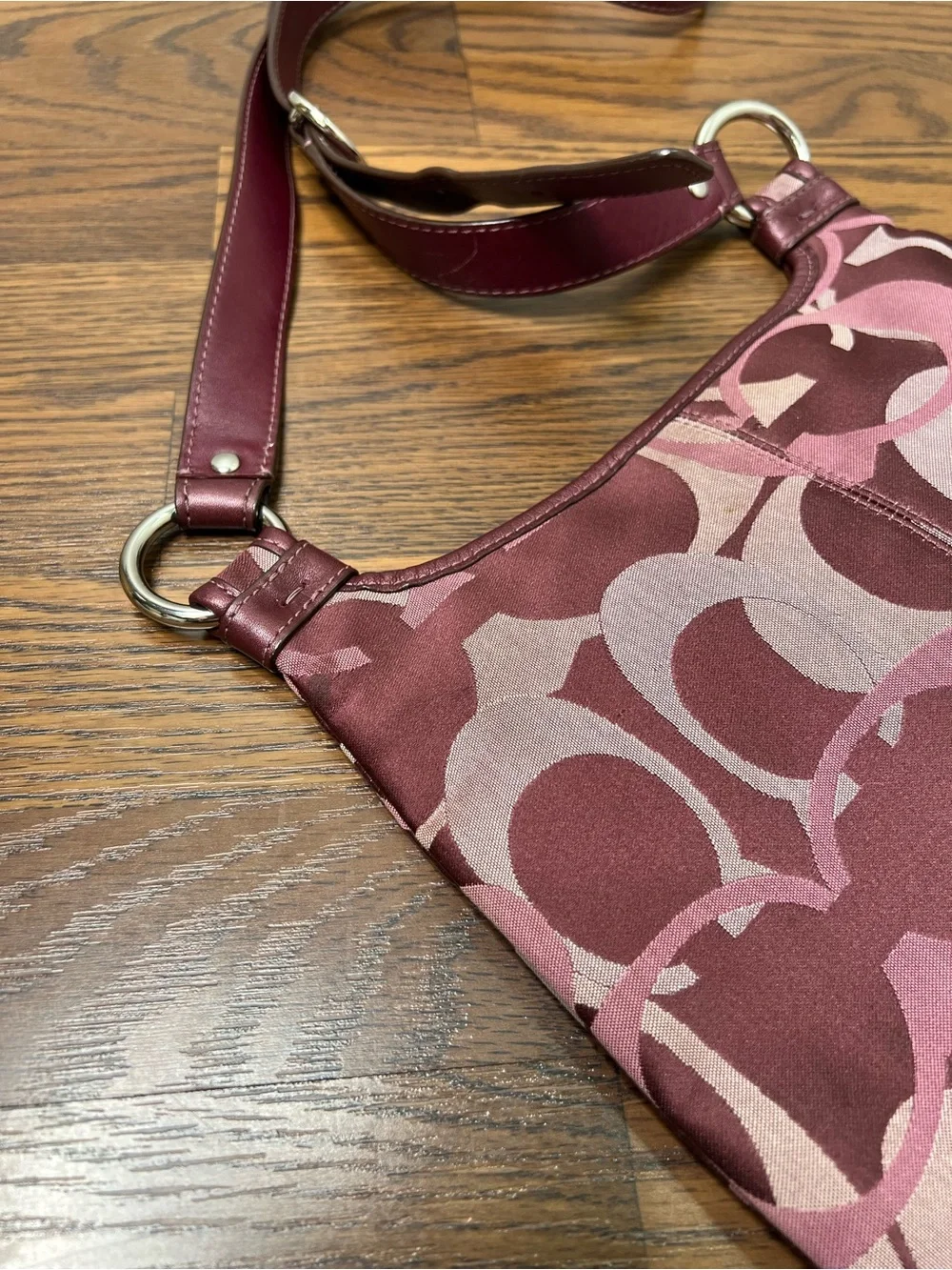 Coach Penelope Optic Signature Hippie Crossbody Bag in a purple/plum color